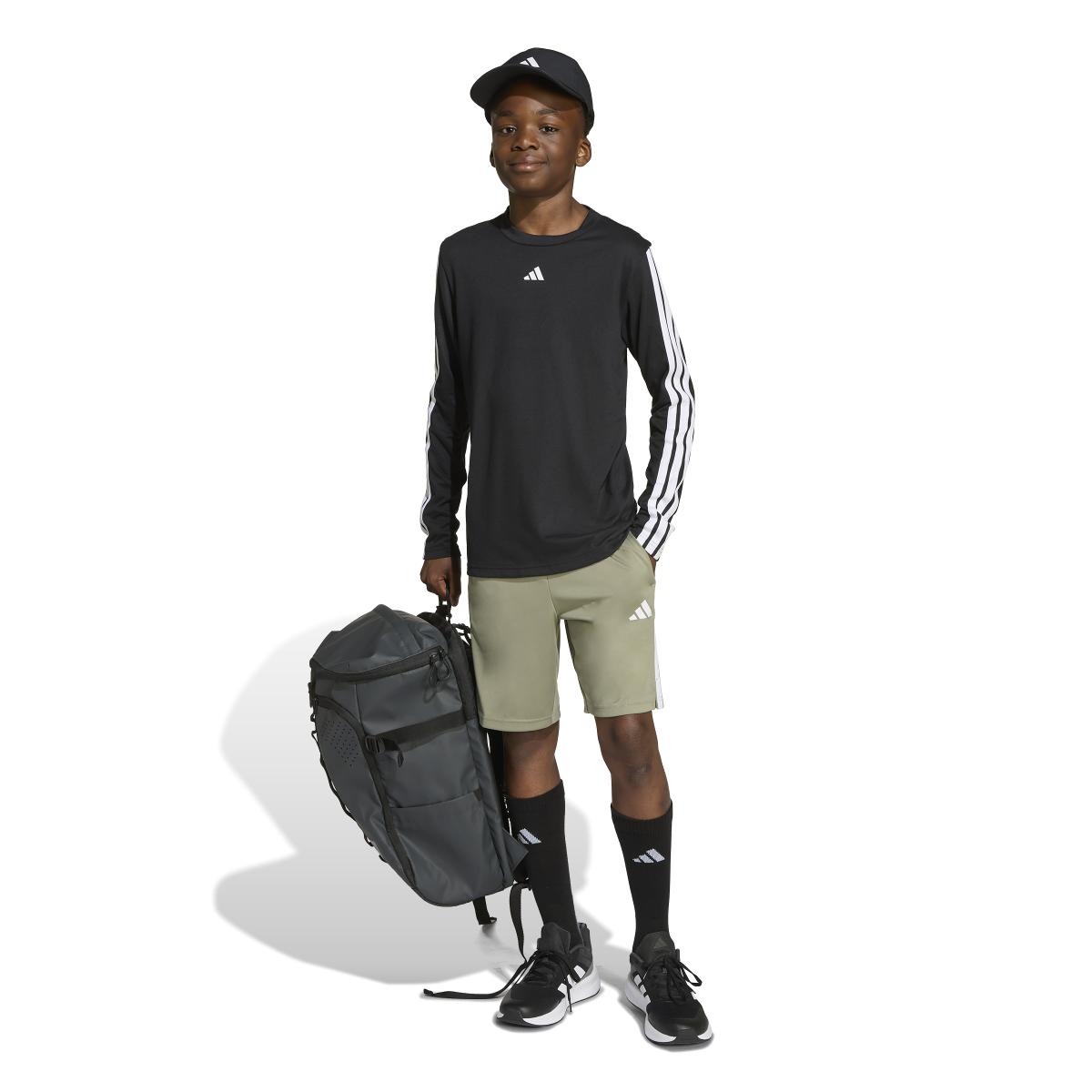 product/2/0/2025_adidas_jm1577_4_apparel_on_model_walking_view_white.jpg