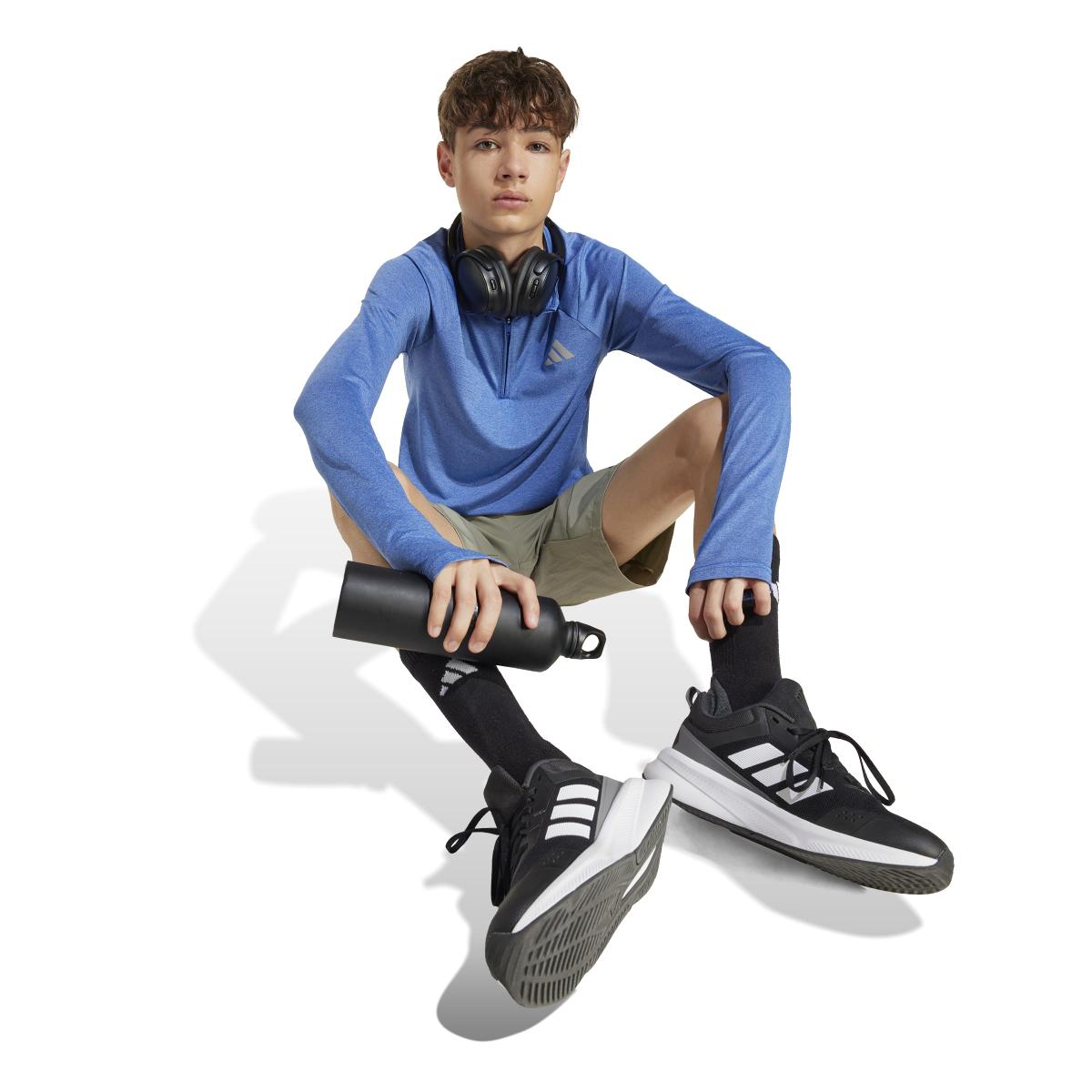 product/2/0/2025_adidas_jm8486_4_apparel_on_model_walking_view_white.jpg