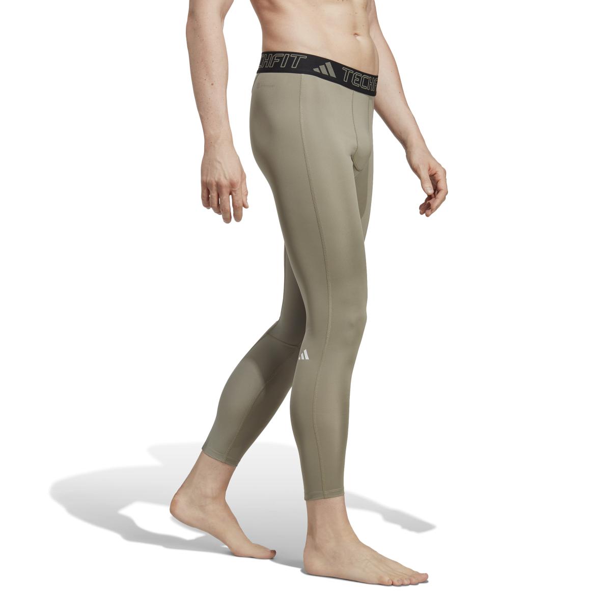 product/a/d/adidas_ic2165_5_apparel_on_model_walking_view_white.jpg