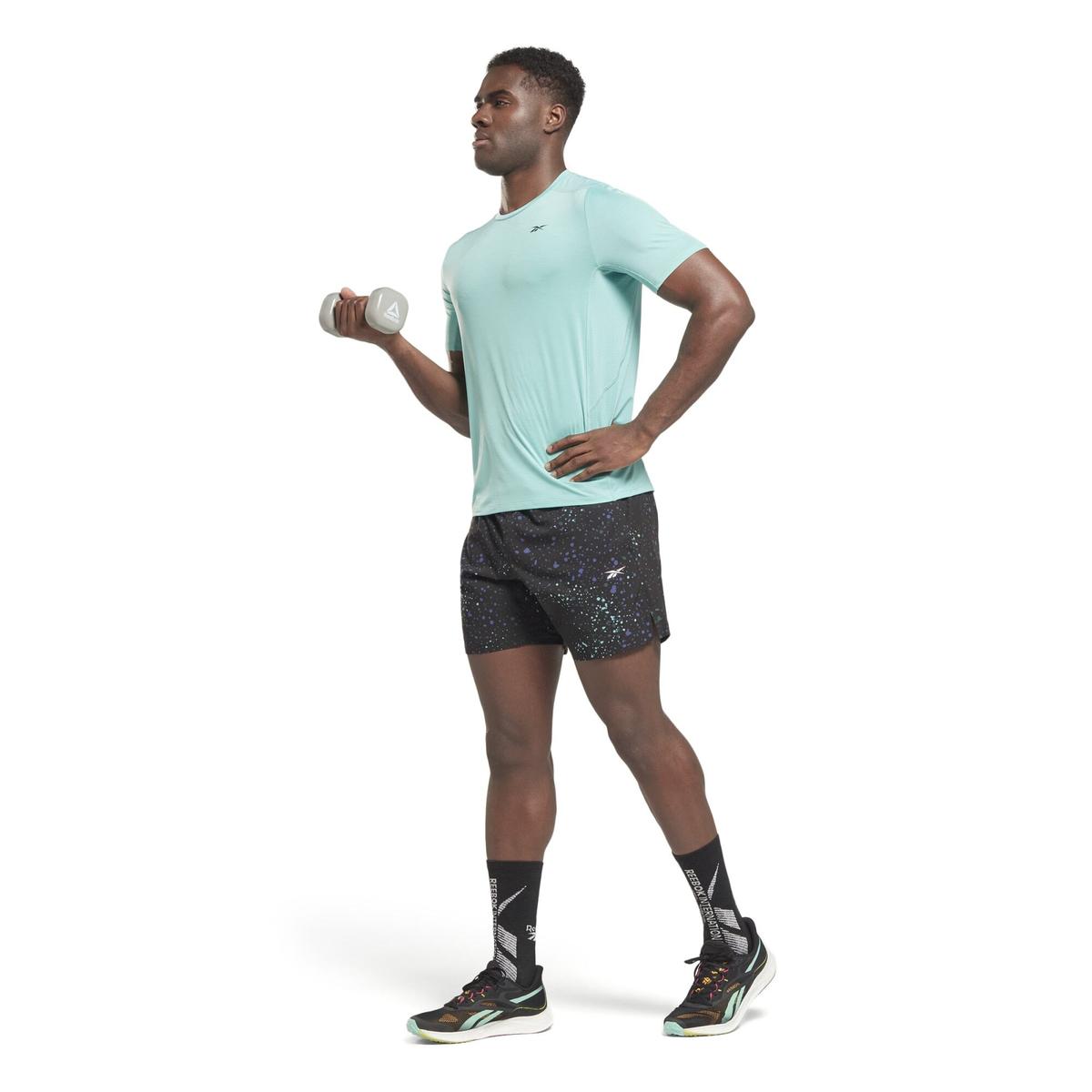 product/r/e/reebok_hg4070_4_apparel_on_model_side_view_white.jpg