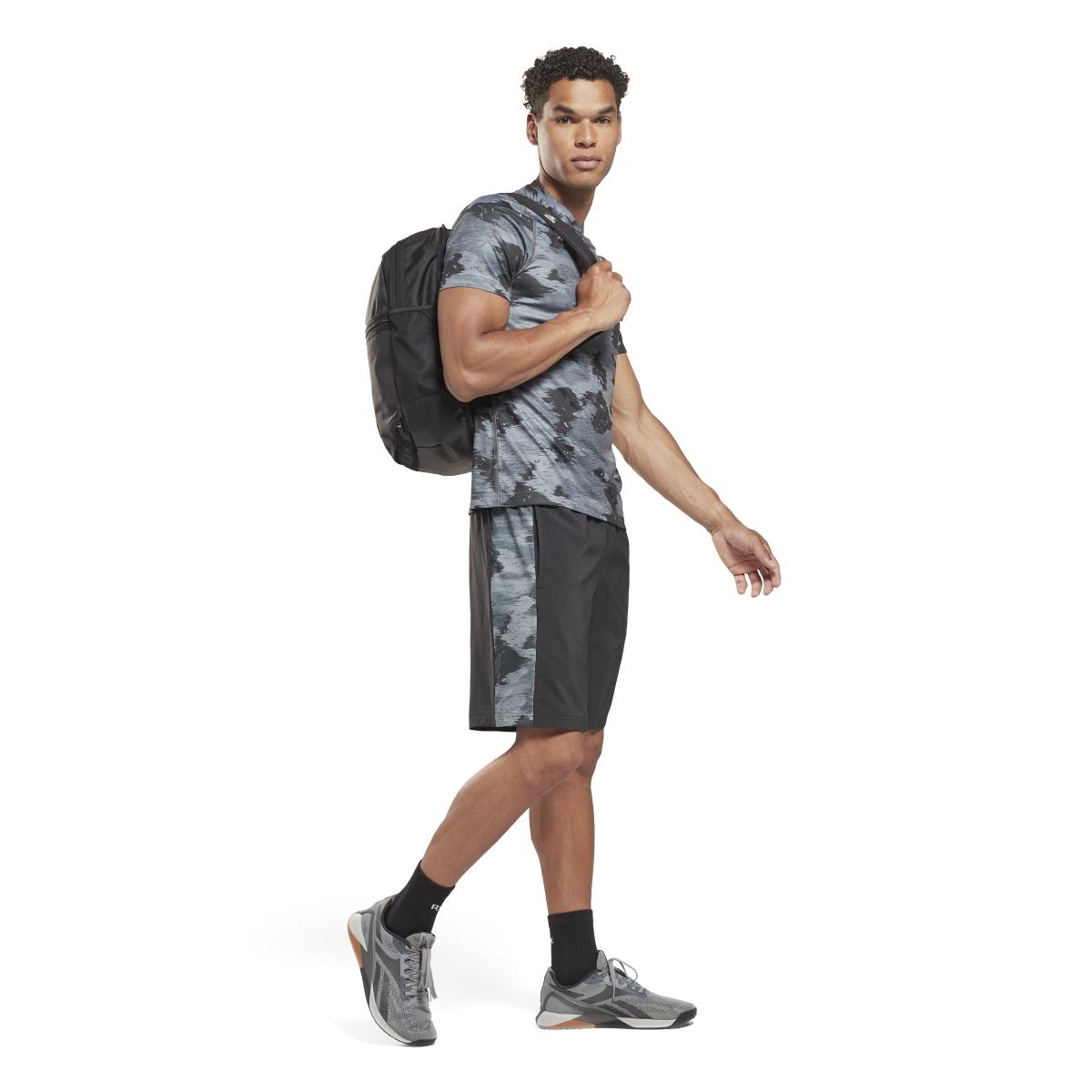 product/r/e/reebok_ht1689_4_apparel_on_model_side_view_white.jpg