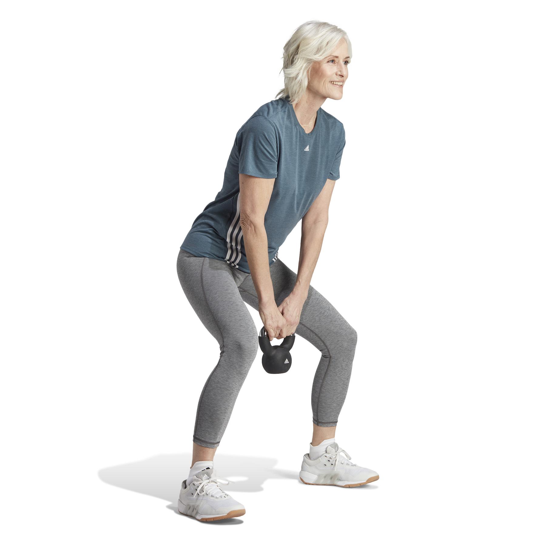 product/2/0/2025_09_adidas_im4764_6_apparel_on_model_walking_view_white.jpg