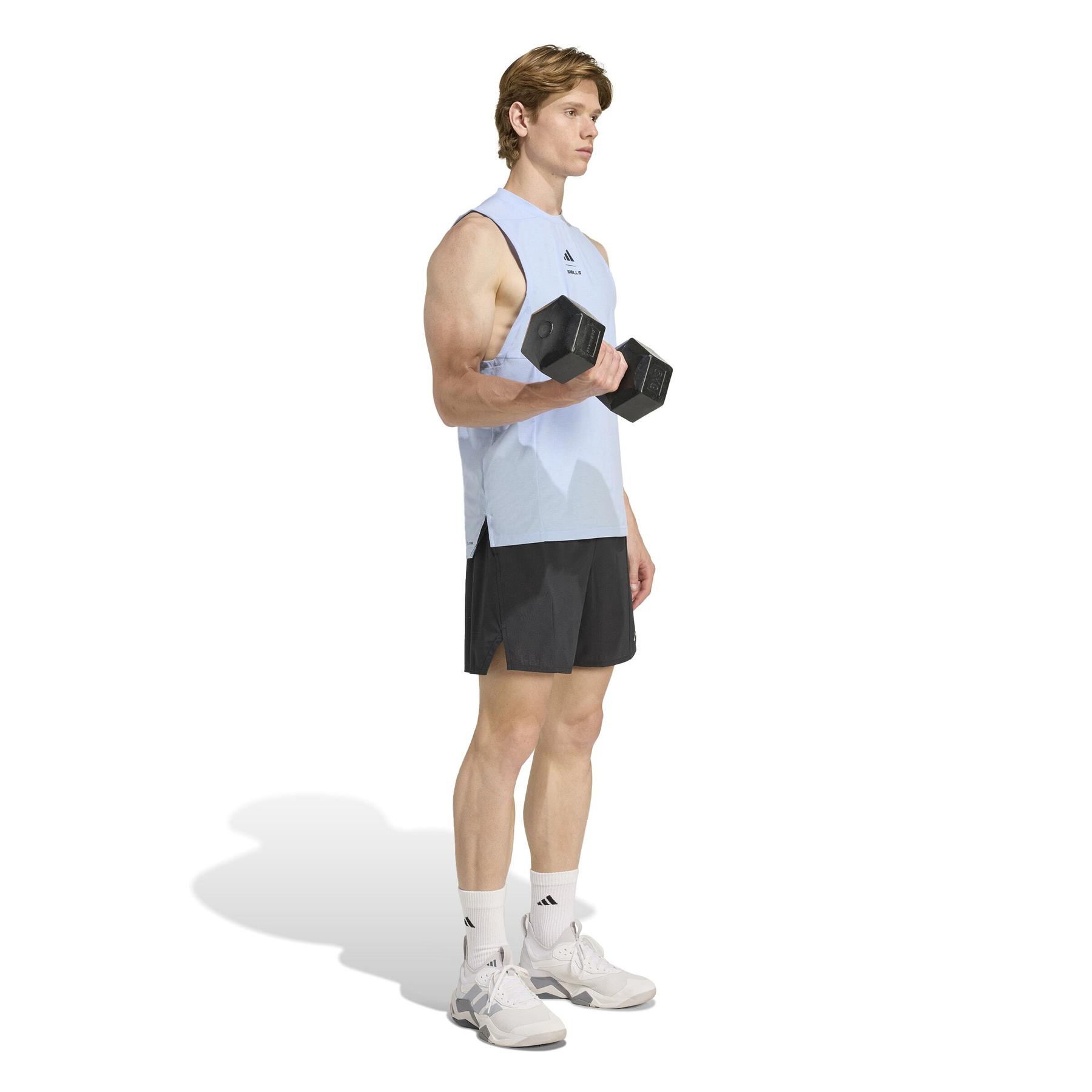 product/2/0/2025_09_adidas_kd4348_4_apparel_on_model_walking_view_white.jpg