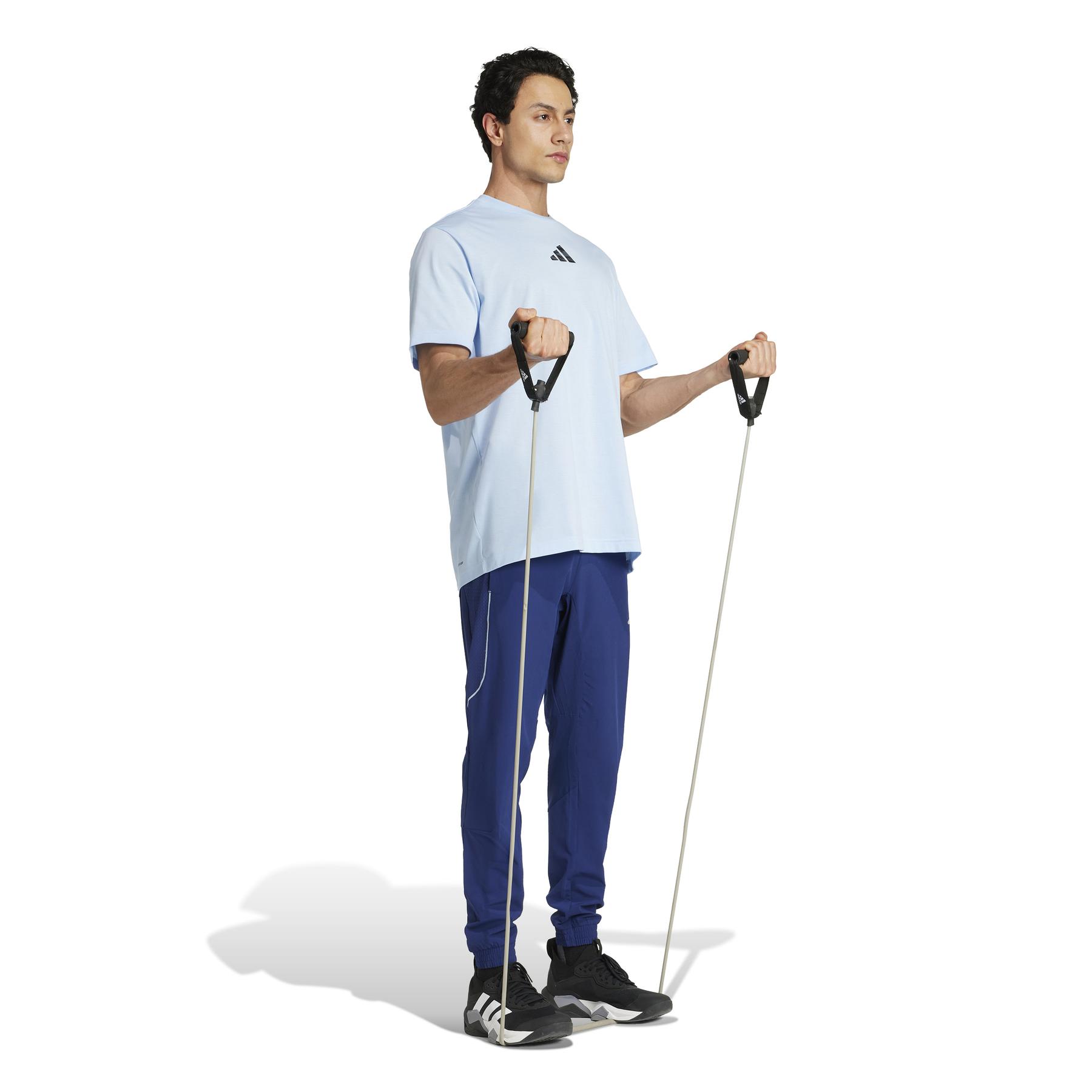 product/2/0/2025_adidas_jm9011_4_apparel_on_model_walking_view_white.jpg