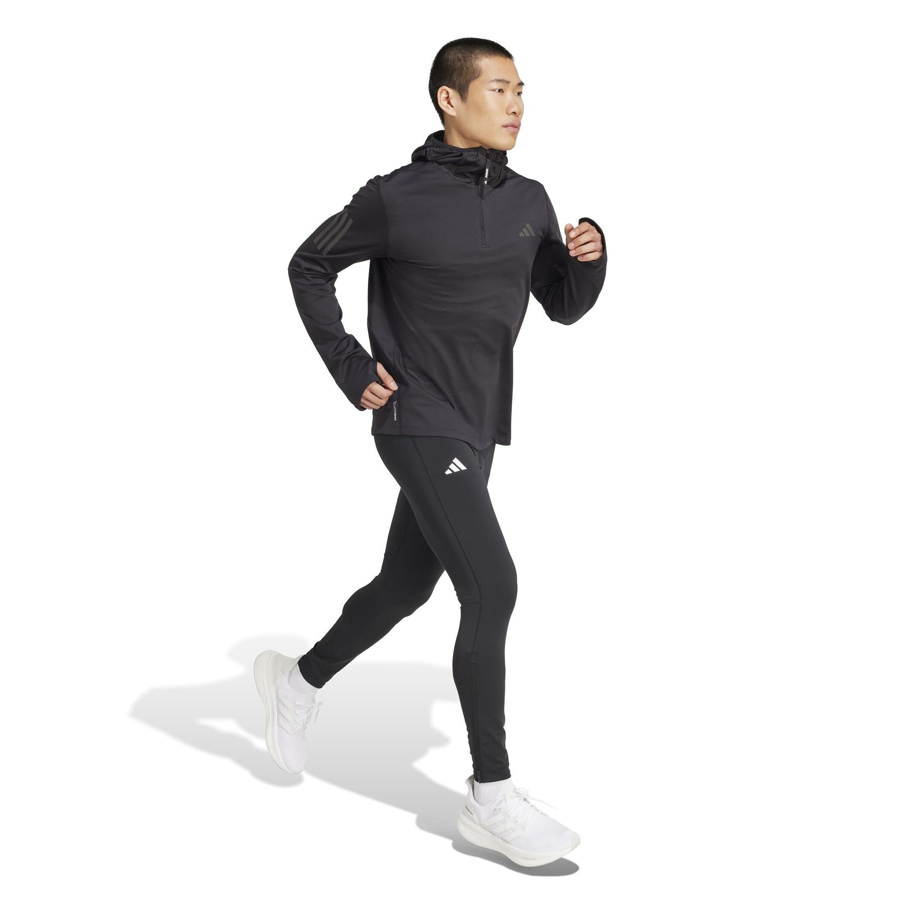 product/2/0/2025_adidas_jn6378_4_apparel_on_model_walking_view_white.jpg