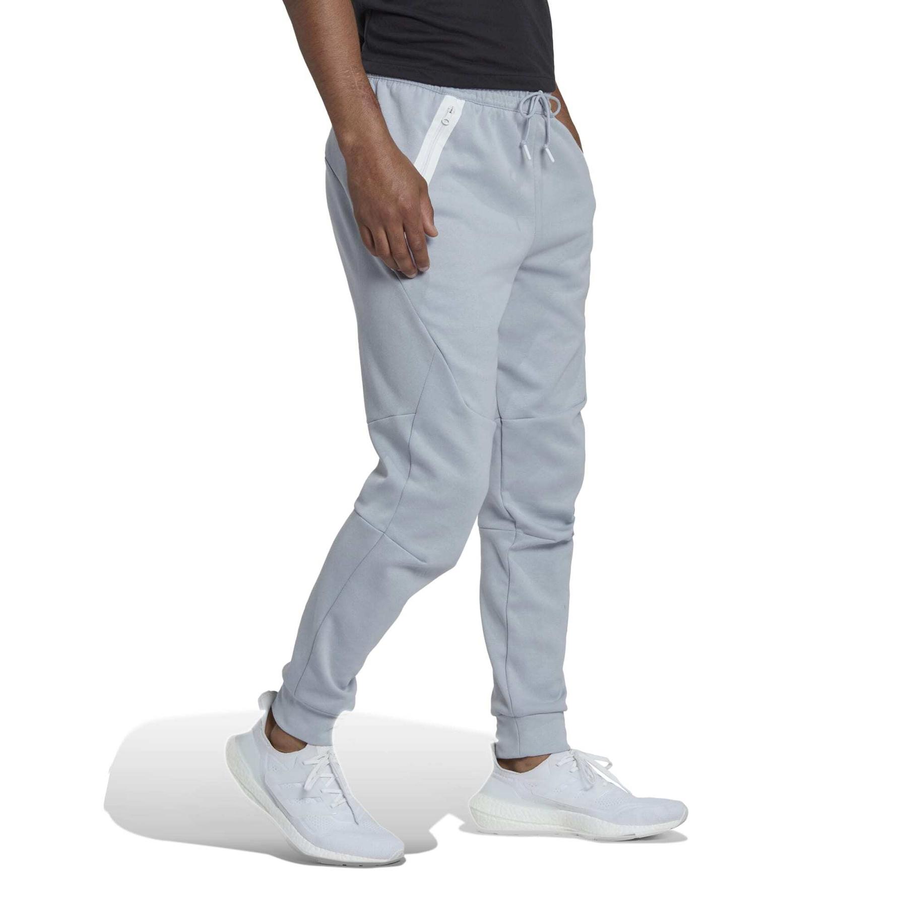 product/a/d/adidas_hm7953_5_apparel_on_model_walking_view_white.jpg