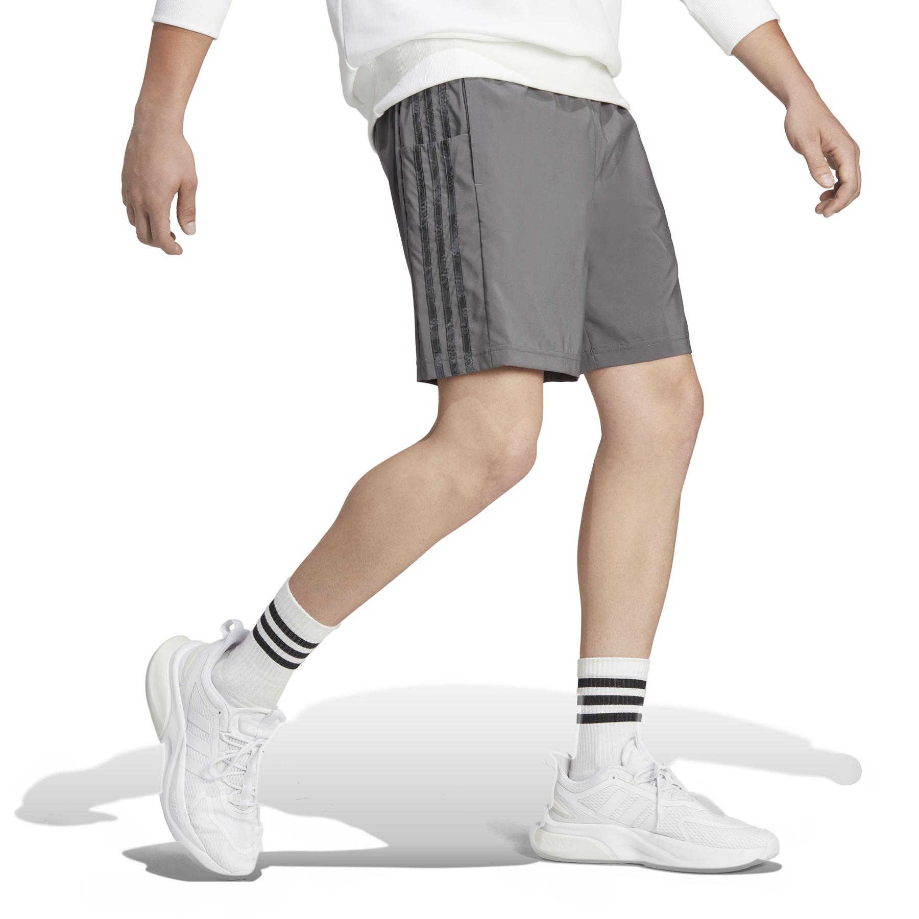 product/a/d/adidas_ic1494_5_apparel_on_model_walking_view_white.jpg