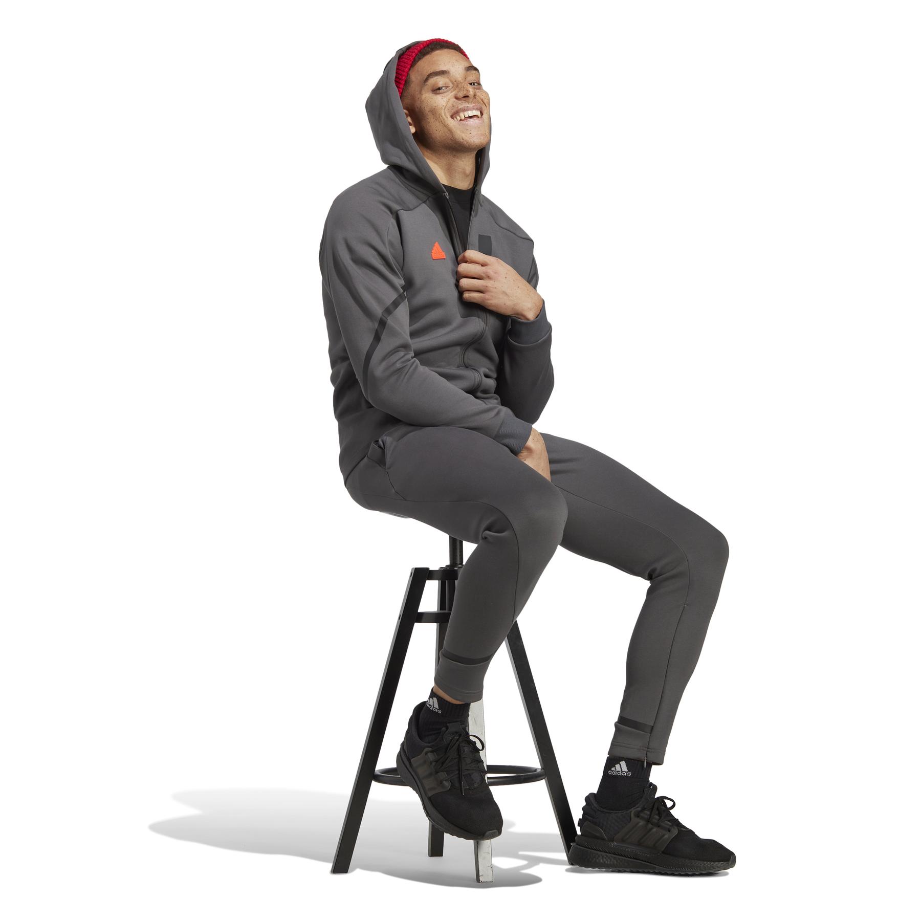 product/a/d/adidas_ic8049_5_apparel_on_model_walking_view_white.jpg