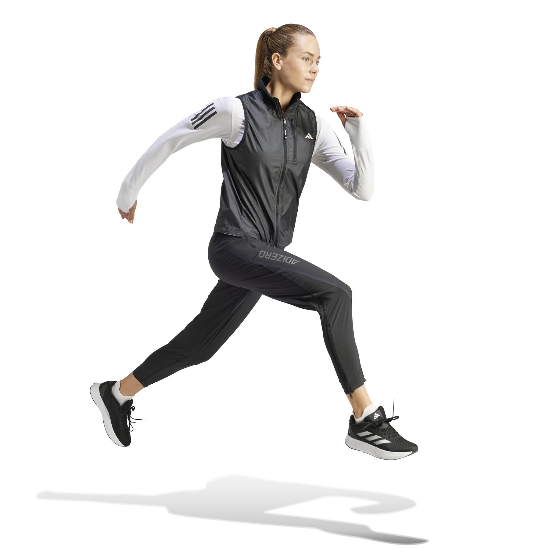 product/a/d/adidas_ik7446_6_apparel_on_model_walking_view_white.jpg