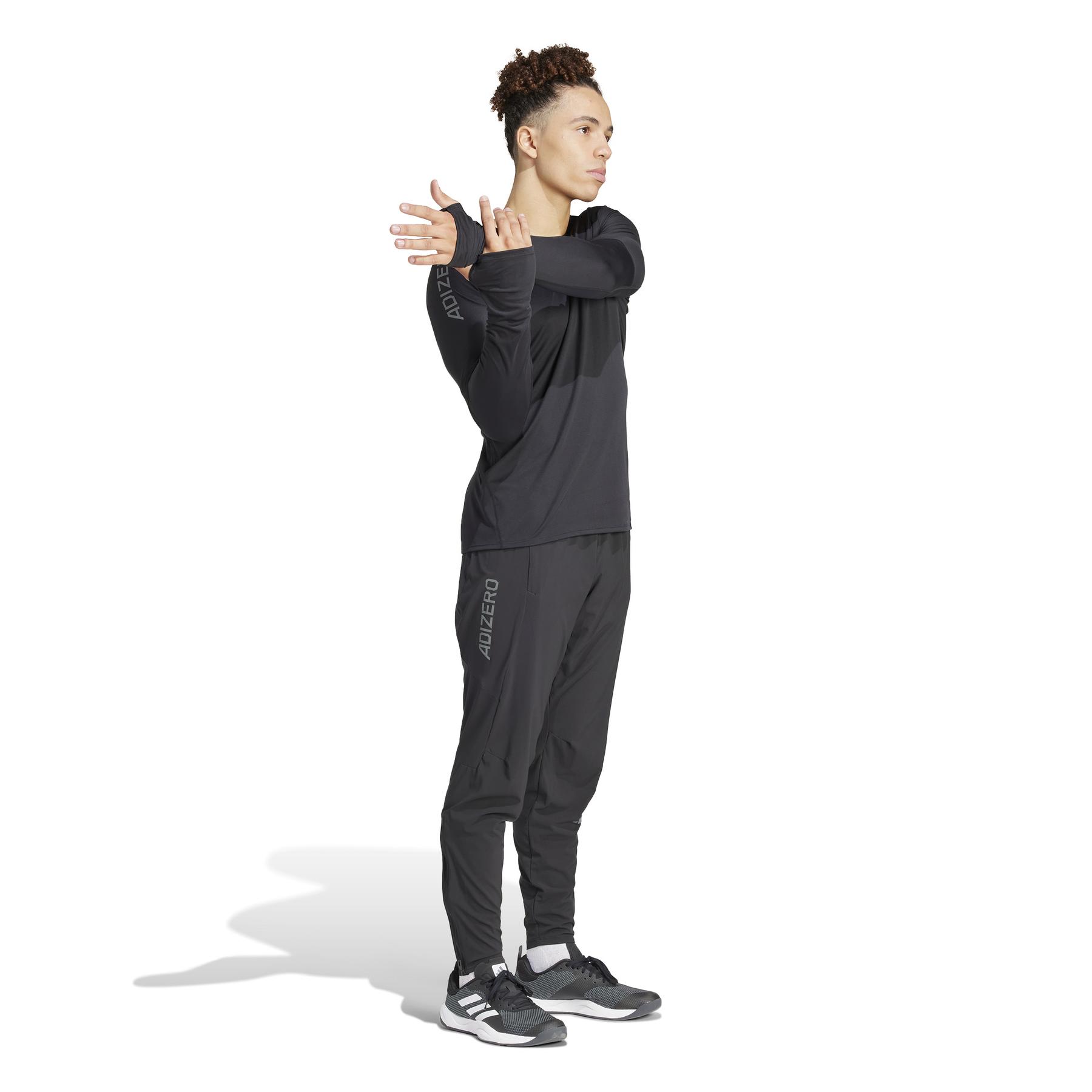 product/a/d/adidas_ik9732_6_apparel_on_model_walking_view_white-nw052224.jpg