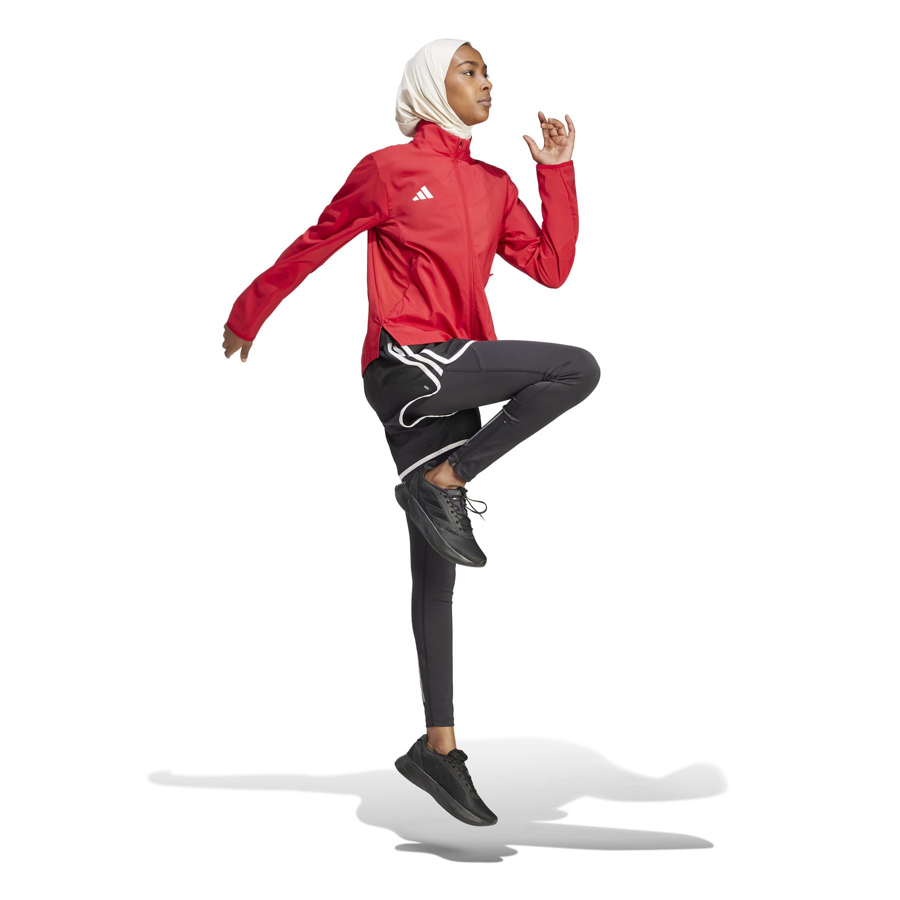 product/a/d/adidas_it1821_7_apparel_on_model_walking_view_white-nw052224.jpg