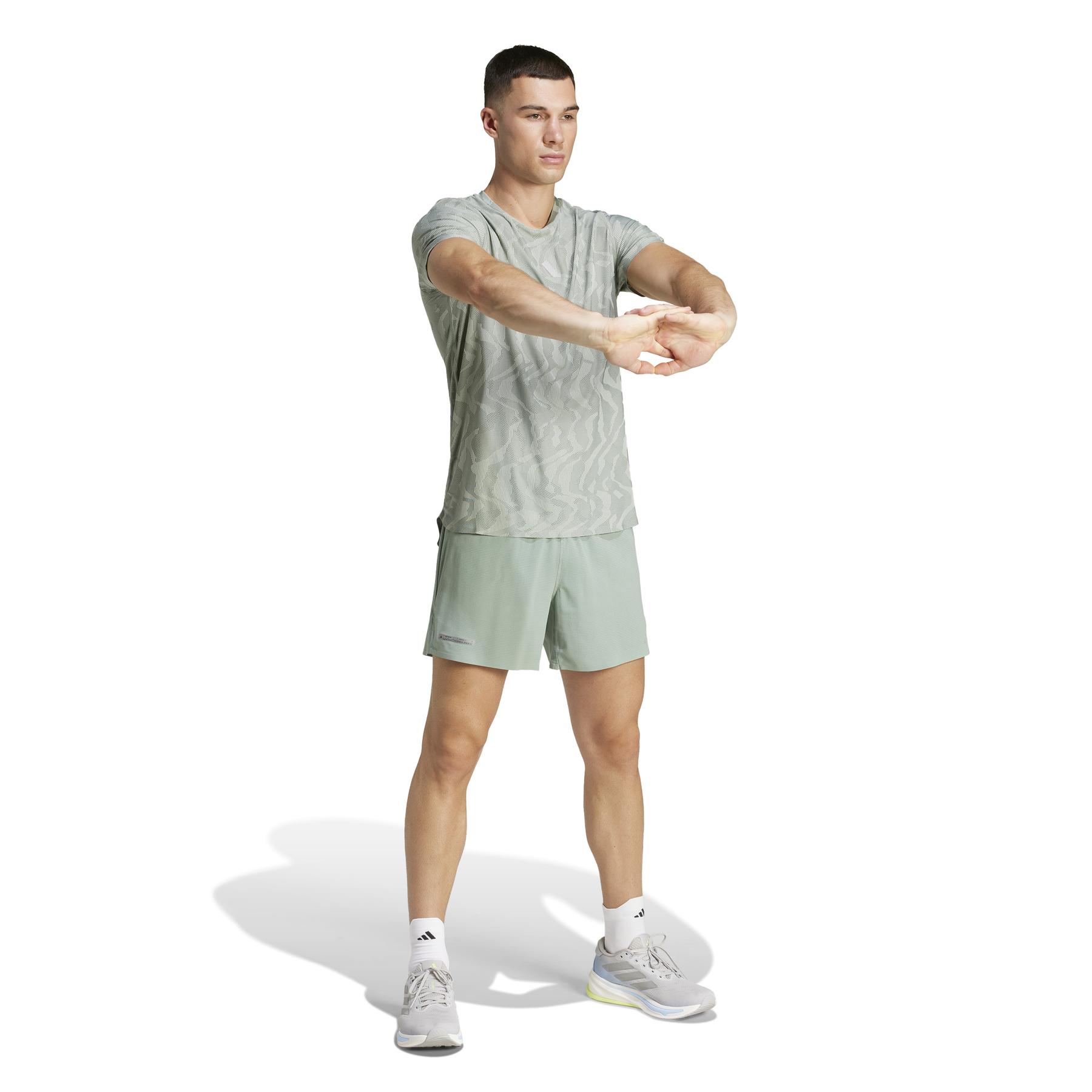 product/a/d/adidas_jd7808_4_apparel_on_model_walking_view_white.jpg