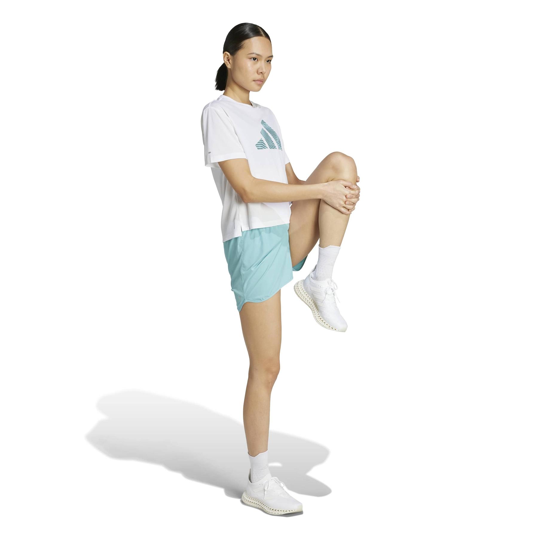 product/a/d/adidas_jn6137_4_apparel_on_model_walking_view_white.jpg