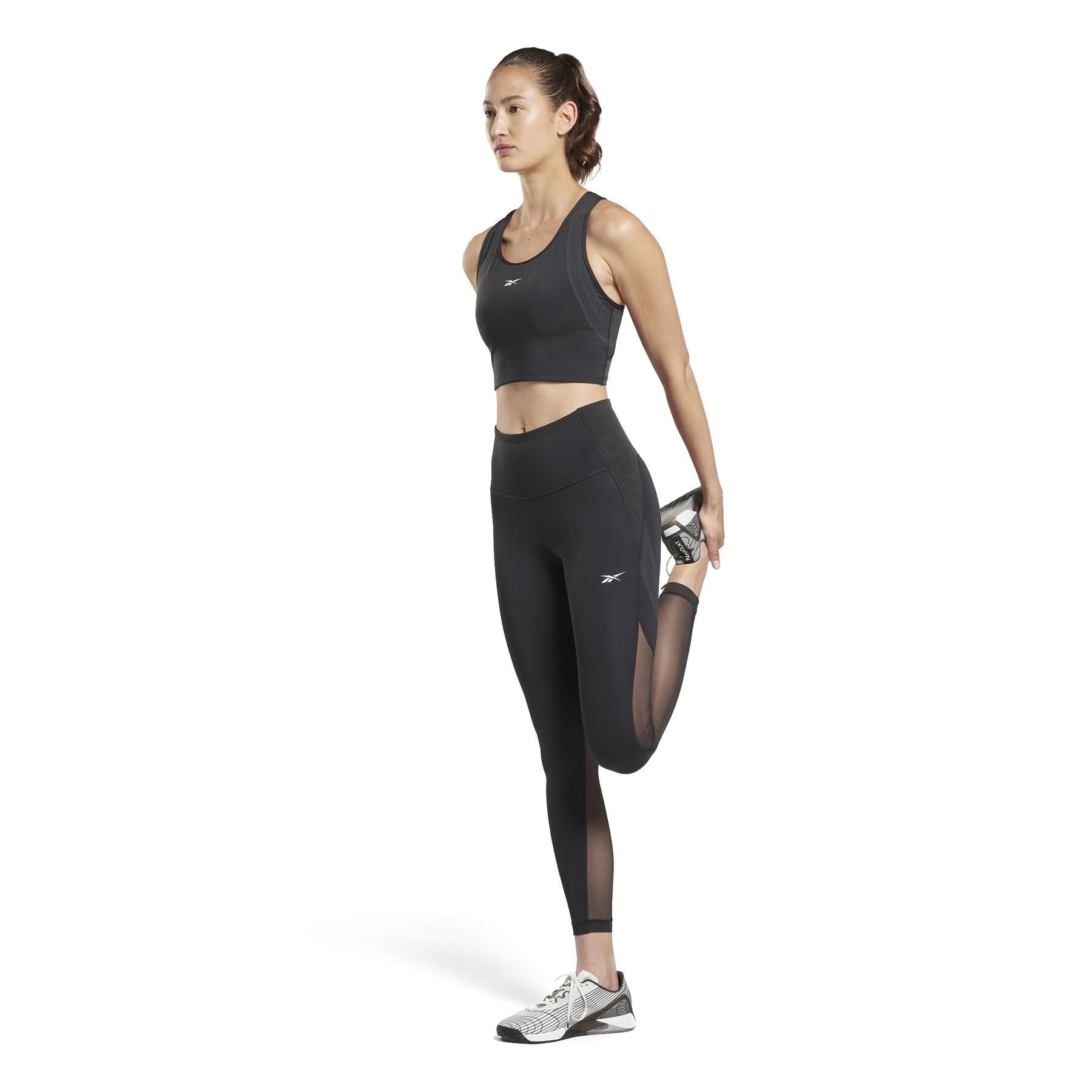 product/r/e/reebok_hf6438_4_apparel_on_model_side_view_white.jpg