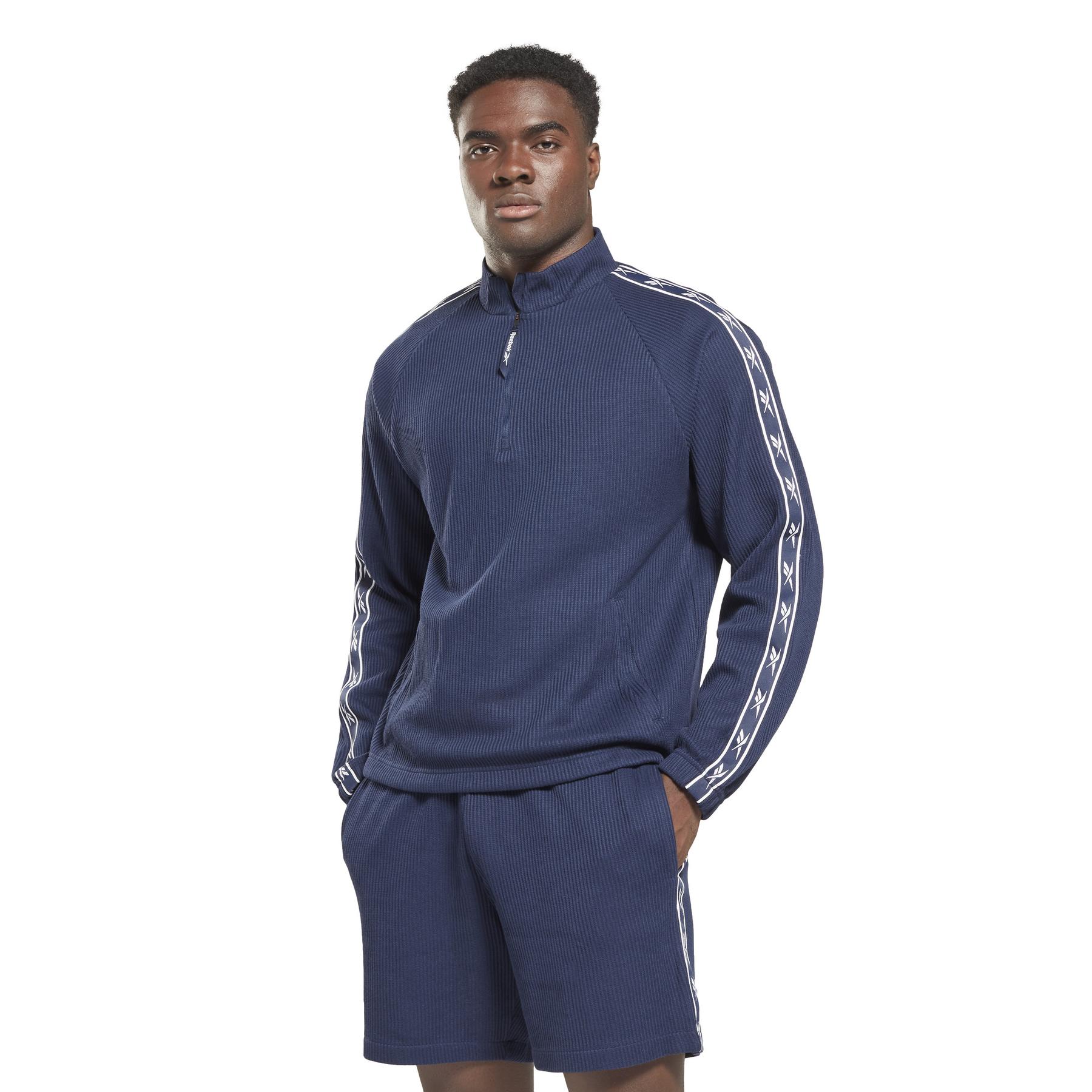 product/r/e/reebok_hs7384_2_apparel_on_model_standard_view_white.jpg