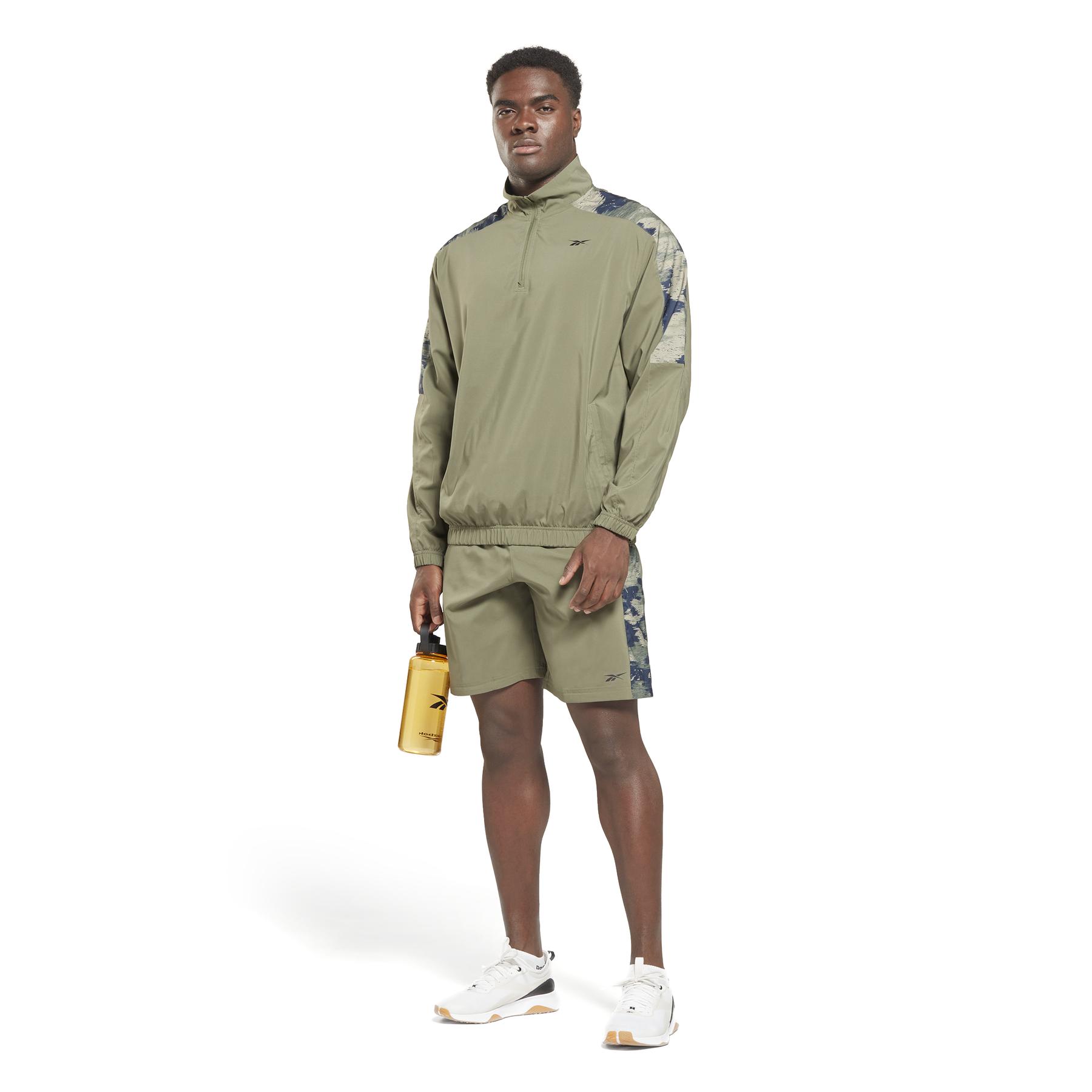 product/r/e/reebok_hs7741_4_apparel_on_model_side_view_white.jpg