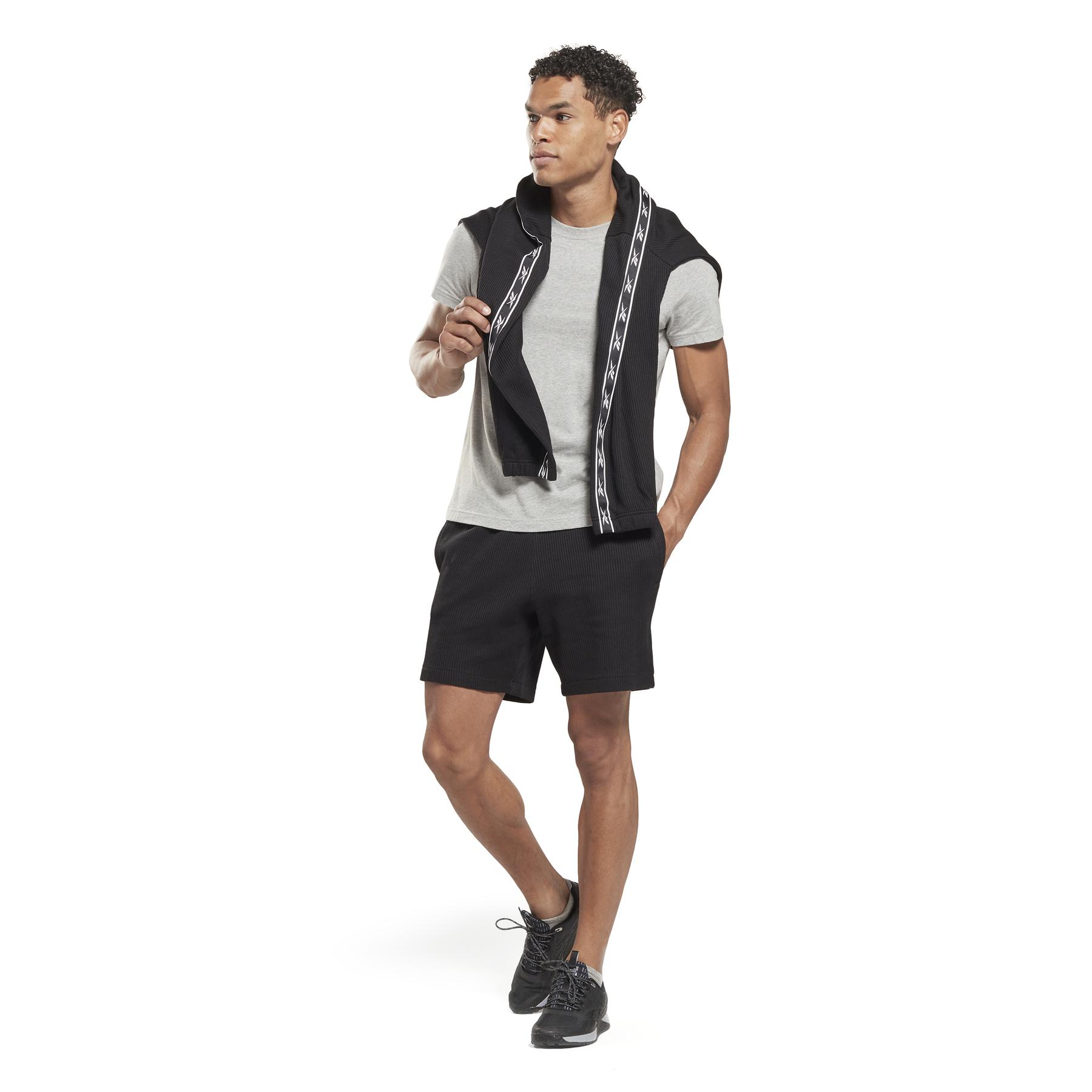 product/r/e/reebok_hs9441_4_apparel_on_model_side_view_white.jpg