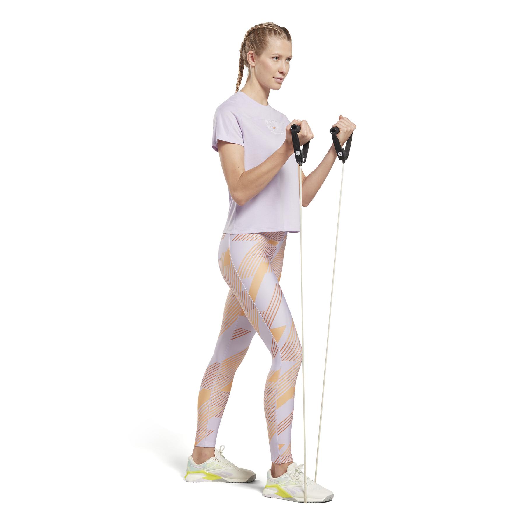 product/r/e/reebok_ht6041_3_apparel_on_model_side_view_white.jpg