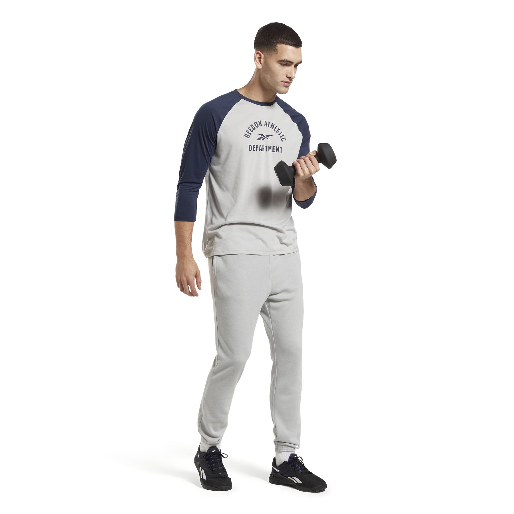 product/r/e/reebok_ic4858_4_apparel_on_model_side_view_white.jpg