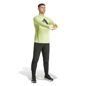 product/a/d/adidas_im8547_5_apparel_on_model_walking_view_white-nw111924.jpg